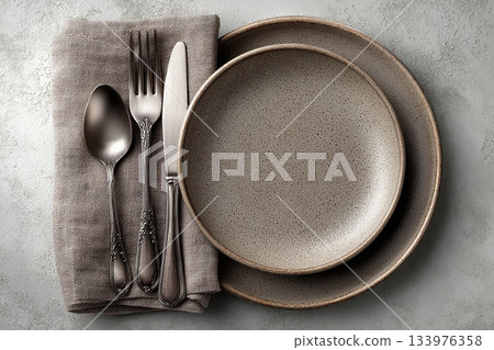 Upscale restaurants. Silverware set. Fork, knife and spoon. Showcasing classic design. Rustic themed. 133976358