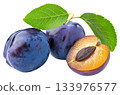 Plum and half fruit with leaf. 133976577