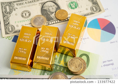 Gold bars with US dollar and Euro banknote money, finance trading investment business currency. Gold bars with US dollar and Euro banknote money, finance trading investment business currency. 133977422