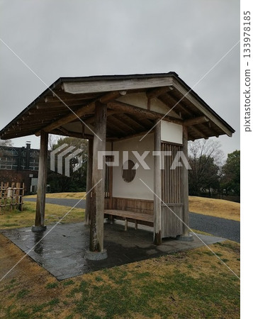 A bench in a town 133978185