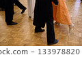 Couples dancing historical polka at vintage ball 133978820