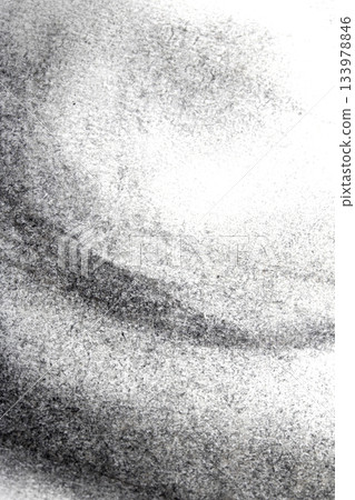 Close up of smudged charcoal on white paper faded background Close up of smudged charcoal on white paper faded background 133978846