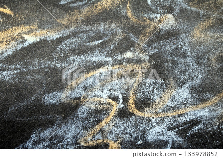 Close up of chalk pastel scribbles on a black paper background abstract Close up of chalk pastel scribbles on a black paper background abstract 133978852
