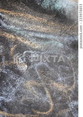 Close up of chalk pastel scribbles on a black paper background abstract Close up of chalk pastel scribbles on a black paper background abstract 133978853