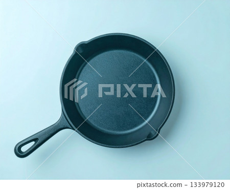 Presentation. Cast iron pan. Kitchenware on white background. Top view. Presentation. Cast iron pan. Kitchenware on white background. Top view. 133979120