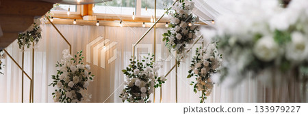 Banner white wedding flowers with blurred lights background and copy space Banner white wedding flowers with blurred lights background and copy space 133979227