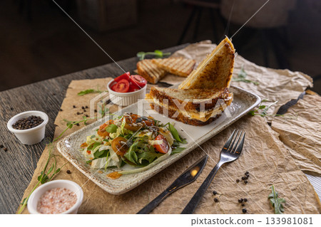 Delicious grilled cheese sandwich Delicious grilled cheese sandwich 133981081