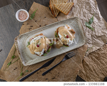 Top view of eggs benedict Top view of eggs benedict 133981108