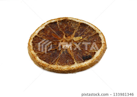 Dried orange slices on white background. Decor for gift wrapping and home decoration for Christmas. for making drinks. Design element for advertising. Dried orange slices on white background. Decor for gift wrapping and home decoration for Christmas. for making drinks. Design element for advertising. 133981346