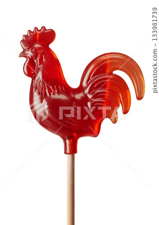 Vibrant red rooster-shaped lollipop candy on stick, isolated on transparent background, function and simple treat for parties or chinese zodiac themes 133981739