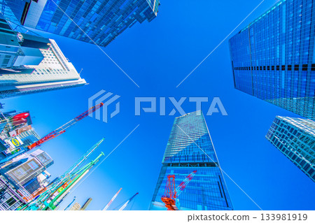 Tokyo cityscape in Japan, December. View of Shibuya's buildings, 3D bees, crawler cranes, and more. Towards a new era 133981919