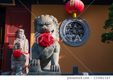 Chinese Imperial guardian lion in front of Longhua temple, Shanghai 133982167