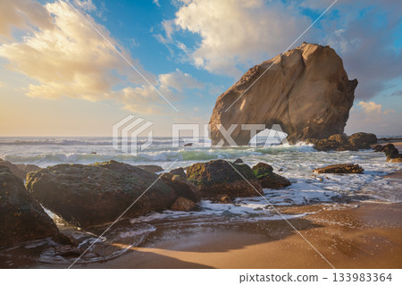 Penedo do Guincho boulder rock at Praia da Santa Cruz, Portugal 133983364