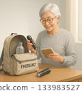 老年人正在檢查他們的緊急疏散包 133983527