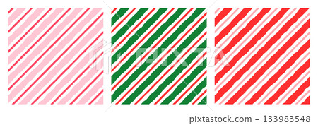 Red, green and pink diagonal stripes vector seamless pattern set, Candy cane holiday backgrounds Red, green and pink diagonal stripes vector seamless pattern set, Candy cane holiday backgrounds 133983548