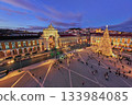 Praca do Comercio in Lisbon features a large Christmas tree and festive lights during evening twilight in winter. Lisbon, Portugal 133984085