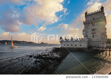 Belem Tower or Tower of St Vincent - famous tourist landmark of Lisboa and tourism attraction - on the bank of the Tagus River Tejo on sunset. Lisbon, Portugal Belem Tower or Tower of St Vincent - famous tourist landmark of Lisboa and tourism attraction - on the bank of the Tagus River Tejo on sunset. Lisbon, Portugal 133984090