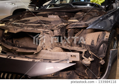 Careful precision is essential when installing a car headlight assembly for optimal performance Careful precision is essential when installing a car headlight assembly for optimal performance 133984118
