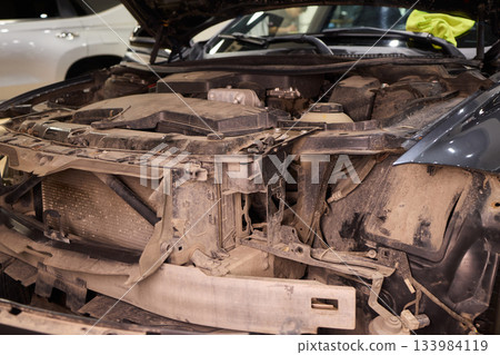 Careful precision is essential when installing a car headlight assembly for optimal performance Careful precision is essential when installing a car headlight assembly for optimal performance 133984119