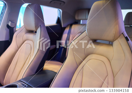 Leather seat details, Innovative craftsmanship emphasizes quality, Exquisite artisan work showcasing micro perforations and carefully crafted contours in leather 133984158