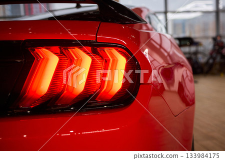 Closeup of a cars automotive tail brake light 133984175