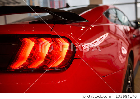 Closeup of a cars automotive tail brake light Closeup of a cars automotive tail brake light 133984176