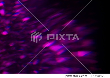 Colored light effects on dark background with grain and magic lights. Neon Glow Modern 90s, lo-fi Aesthetics. Design effect. 133984209
