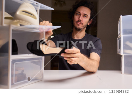 Organizing clear shoe containers effectively, Arranging transparent footwear storage with focus and style, Meticulous placement of feedthrough shoe boxes in minimalist Organizing clear shoe containers effectively, Arranging transparent footwear storage with focus and style, Meticulous placement of feedthrough shoe boxes in minimalist 133984582