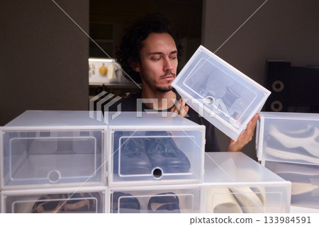 Organizing clear shoe containers effectively, Arranging transparent footwear storage with focus and style, Meticulous placement of feedthrough shoe boxes in minimalist Organizing clear shoe containers effectively, Arranging transparent footwear storage with focus and style, Meticulous placement of feedthrough shoe boxes in minimalist 133984591