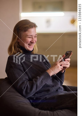 Young lady with cerebral palsy studying using technological aids, Enthusiastic woman with cerebral palsy learning with aid of modern assistive technology at bright workspace Young lady with cerebral palsy studying using technological aids, Enthusiastic woman with cerebral palsy learning with aid of modern assistive technology at bright workspace 133984835