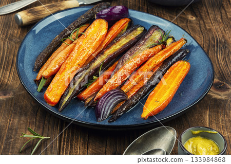 Delicious roasted baby carrots. Delicious roasted baby carrots. 133984868
