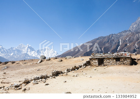 Everest base camp trekking path in Dingboche area, Nepal 133984952