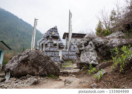 Rocks painted with prayers along EBC trek, Nepal 133984999