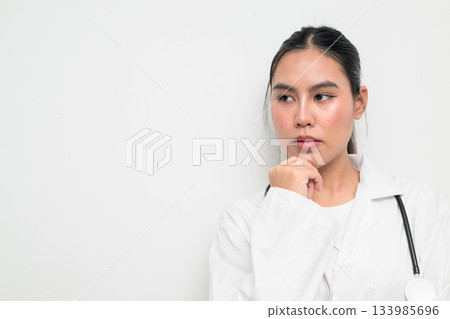 Woman Doctor with Stethoscope in White Uniform on Plain Background Planning Woman Doctor with Stethoscope in White Uniform on Plain Background Planning 133985696