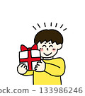 A child happy to receive a present 133986246