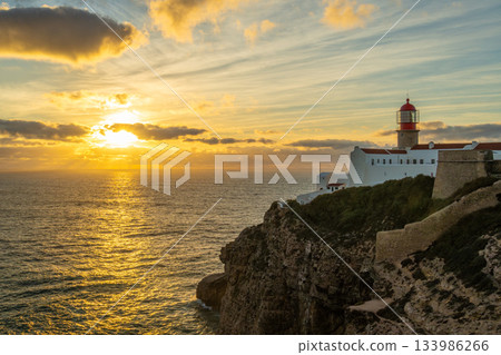Ponta da Piedade Lighthouse and Atlantic Ocean at Sunset. Algarve, Portugal Ponta da Piedade Lighthouse and Atlantic Ocean at Sunset. Algarve, Portugal 133986266