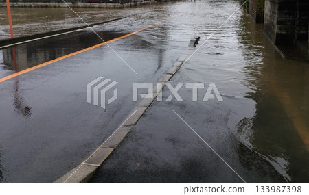 Flooded roads and streets due to heavy rain 133987398