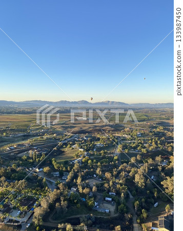 The view from above on a hot air balloon The view from above on a hot air balloon 133987450