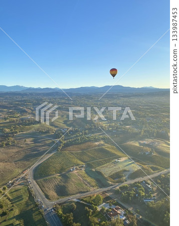 The view from above on a hot air balloon The view from above on a hot air balloon 133987453