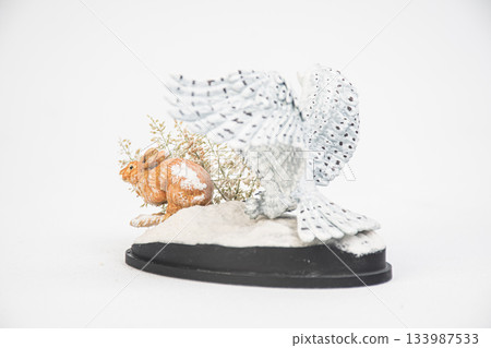The owl is hunting rabbits on isolated background The owl is hunting rabbits on isolated background 133987533