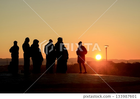People watching the sunrise at Takinomizu Park in Nagoya People watching the sunrise at Takinomizu Park in Nagoya 133987601