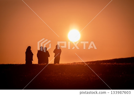 People watching the sunrise at Takinomizu Park in Nagoya People watching the sunrise at Takinomizu Park in Nagoya 133987603
