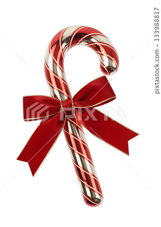 Shiny red and white candy cane styled christmas ornament, tied with classic red bow, isolated on transparent background 133988817