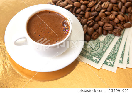 The image showcases a cup of aromatic Turkish coffee with roasted beans The image showcases a cup of aromatic Turkish coffee with roasted beans 133991005