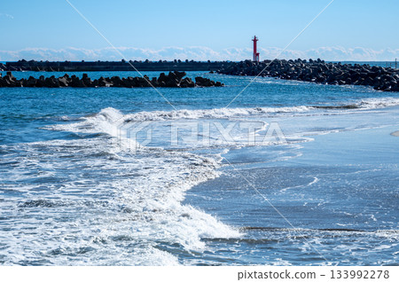 Beautiful seascape of Kawarago Coast with red lighthouse and white waves in Hitachi City, Ibaraki Prefecture Beautiful seascape of Kawarago Coast with red lighthouse and white waves in Hitachi City, Ibaraki Prefecture 133992278