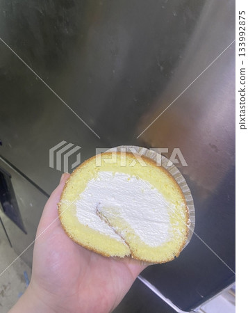 A soft, fluffy roll cake with a delicate sponge and creamy filling, perfect for a light dessert or afternoon snack. A sweet, indulgent treat with a smooth texture and rich flavor. A soft, fluffy roll cake with a delicate sponge and creamy filling, perfect for a light dessert or afternoon snack. A sweet, indulgent treat with a smooth texture and rich flavor. 133992875