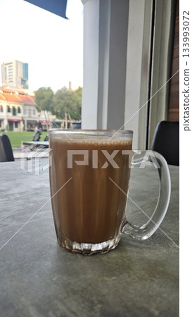 This is a group of food with Roti Canai, Teh Tarik and Curry This is a group of food with Roti Canai, Teh Tarik and Curry 133993072
