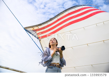 Ferry and camera girl 133993579