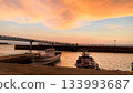 Sunset at the fishing port and calm sea 133993687