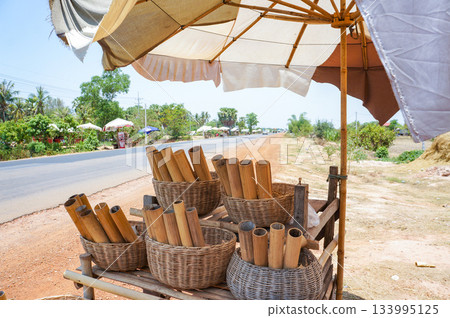 The famous bamboo rice sold on the side of a rural road in Cambodia 133995125